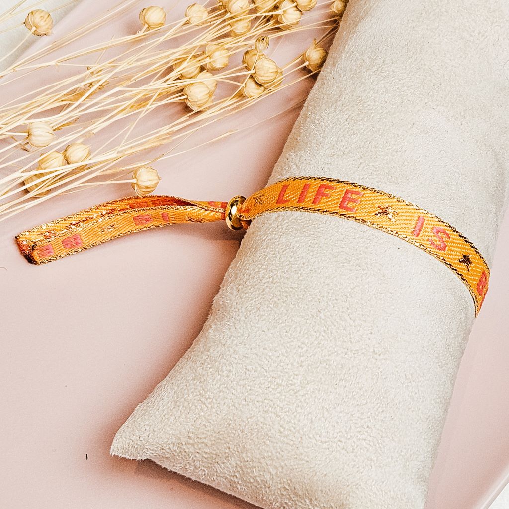 LINTJES ARMBAND LIFE IS BEAUTIFUL armband-geweven-lintjes-life-is-beautiful-oranje-roze-festival-armbandje-fashion-sieraden-musthaves-ibiza-boutique