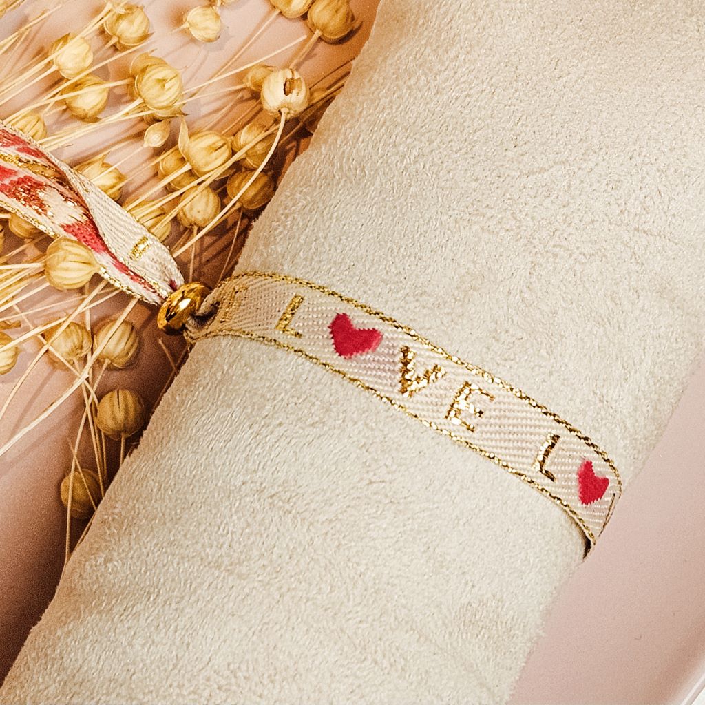 LINT ARMBANDJE LOVE ROZE geweven-lint-armbandje-love-roze-ibiza-musthaves