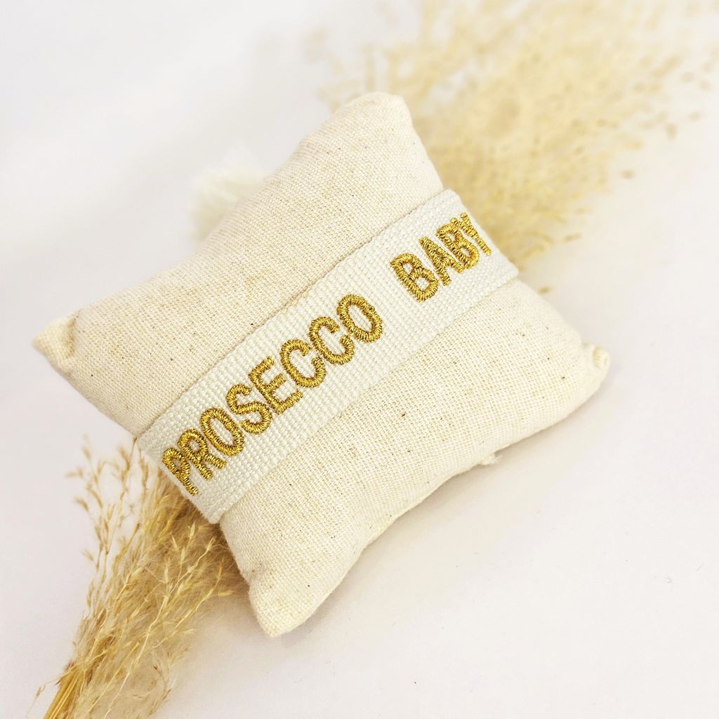 geweven-armband-creme-goud-prosecco-baby-statement-bracelet