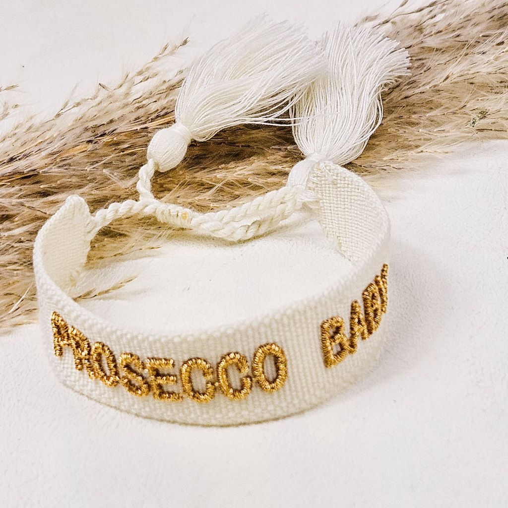 GEWEVEN ARMBAND PROSECCO BABY geweven-armband-creme-goud-prosecco-baby-statement-bracelet