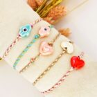 armband-keramiek-hamsa-hand-blauw-roze-ibiza-style